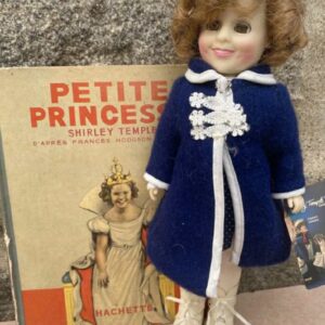 Poupée chapeau ancienne d'occasion avec livre